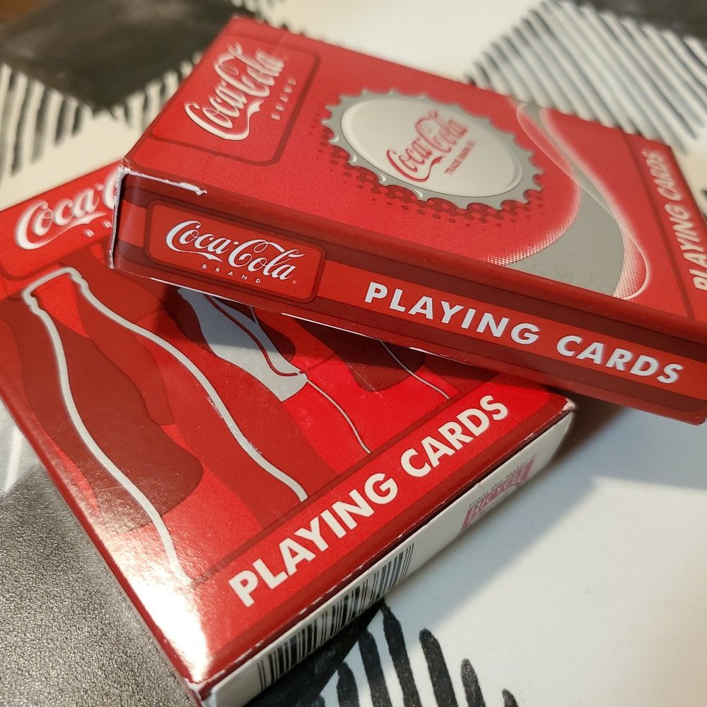 Coca cola playing cards 2 decks sealed.